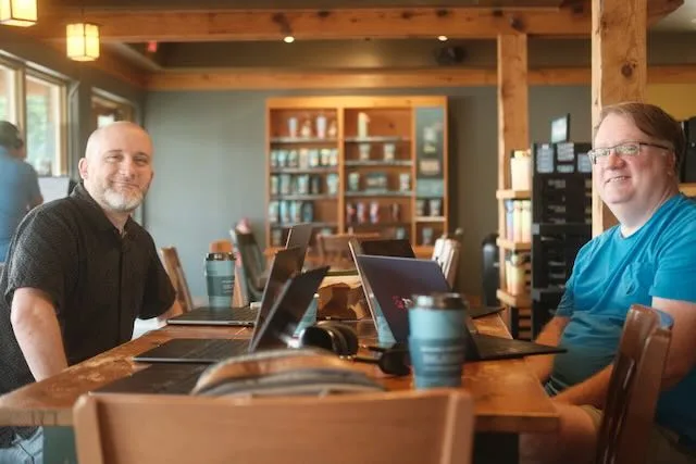 3 guys with 8 laptops between them. Mondays at Caribou.
